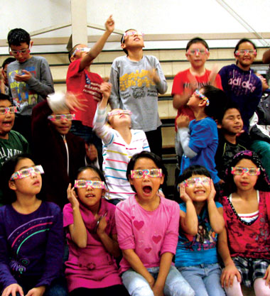 Environmental Report Wearing defraction glasses, students in Noorvik, Alaska, enjoy a burst of color in an optics demonstration with strobe light. A “Fun with Science” road show reached out to 400 students in villages in the far north. Travel was funded by LLNL’s vendor for supplemental labor, Akima, LLC, which has a strong connection to Alaska. cover.