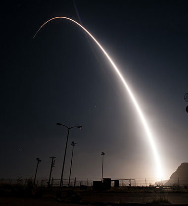 A Minuteman III intercontinental ballistic missile streaks through the night sky from Vandenberg Air Force Base in California to waters off the Kwajalein Atoll in the Marshall Islands carrying a mock W87 warhead in a highly instrumented flight test.