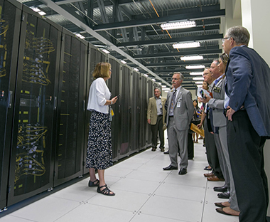 Environmental Report Acting Computation Associate Director Kim Cupps gives a tour of the new high-performance computing facility, home to some of LLNL’s newest unclassified machines. The facility supports academic alliances and important initiatives such as the DOE-wide exascale computing project. cover.
