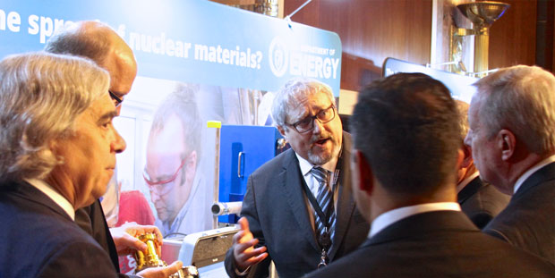 Environmental Report DOE Secretary Ernest Moniz and LLNL Director William Goldstein converse with visitors at the National Security Lab Day on Capitol Hill, held at the Dirksen Senate Office Building in October 2015. LLNL served as the lead laboratory in preparing the displays. cover.