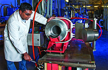 Safety in work practices is paramount, especially in facilities such as the High Explosives Applications Facility, which houses high-explosives firing tanks, energetic-material synthesis laboratories, and a two-stage gun (shown with technician Paul Dealmeida) for shock-physics experiments.