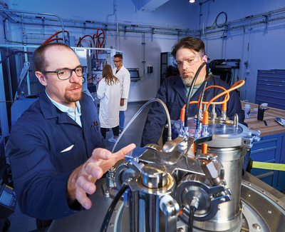 Researchers examine new capabilities in the Facility for Advanced Manufacturing of Energetics within the Energetic Materials Development Enclave Campus.