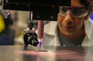 An LLNL materials scientist 3D prints with Energy Ink to create graphene aerogel electrodes for supercapacitors.