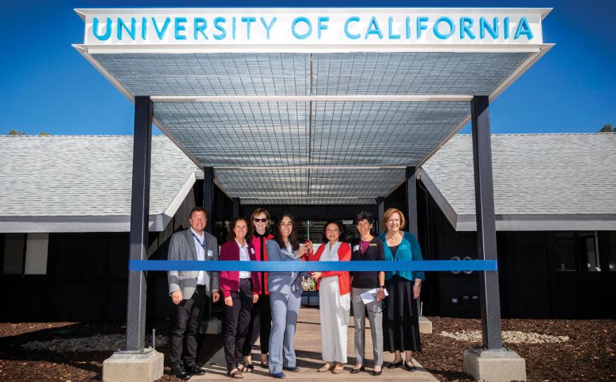 LLNL Director Kim Budil and dignitaries dedicate the UC Livermore Collaboration Center with a ceremonial ribbon cutting.